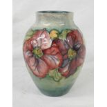 MOORCROFT GREEN/BLUE GROUND VASE WITH PANSY PATTERN,