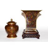 A cloisonne flared vase with a wooden stand, and a cloisonne vase and cover, 20th century. Largest
