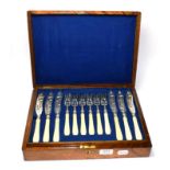 A cased set of Victorian Silver and Ivory Fish-Eaters, The Silver Mounts Probably by John Gilbert,