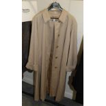 Burberry women's swing style wool coat, with vertical pockets and raglan sleeves. 44'' chest and