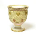 A Royal Worcester reticulated gilt and enamel decorated vase in the manner of George Owen. Date code