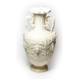 A Copeland Parian twin-handled vase. Printed mark, 38cm.. One inch section of loss to the rim. One