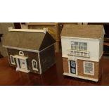 Edwardian style dolls house with papered and painted exterior, balustrade, two windows and front