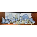 A quantity of Wedgewood Jasper ware, including pin tray vases, plates, urns etc