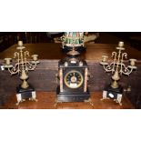 A Victorian slate clock garniture
