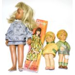 Circa 1970s blonde Sasha doll wearing a blue sprigged mini dress; Peggy Mod Doll in original box;