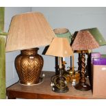A selection of modern table lamps including a pair of patinated bronze baluster form lamps, two