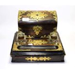 A Victorian coromandel wood and brass mounted inkwell/stationary desk stand with slide drawer . Good