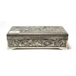 A silver plate dressing-table box, in the Persian or Indian style, oblong, the cover and sides