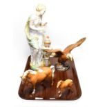 Two Beswick horses, a Beswick bald eagle numbered 1018, and a Continental ceramic figure of a