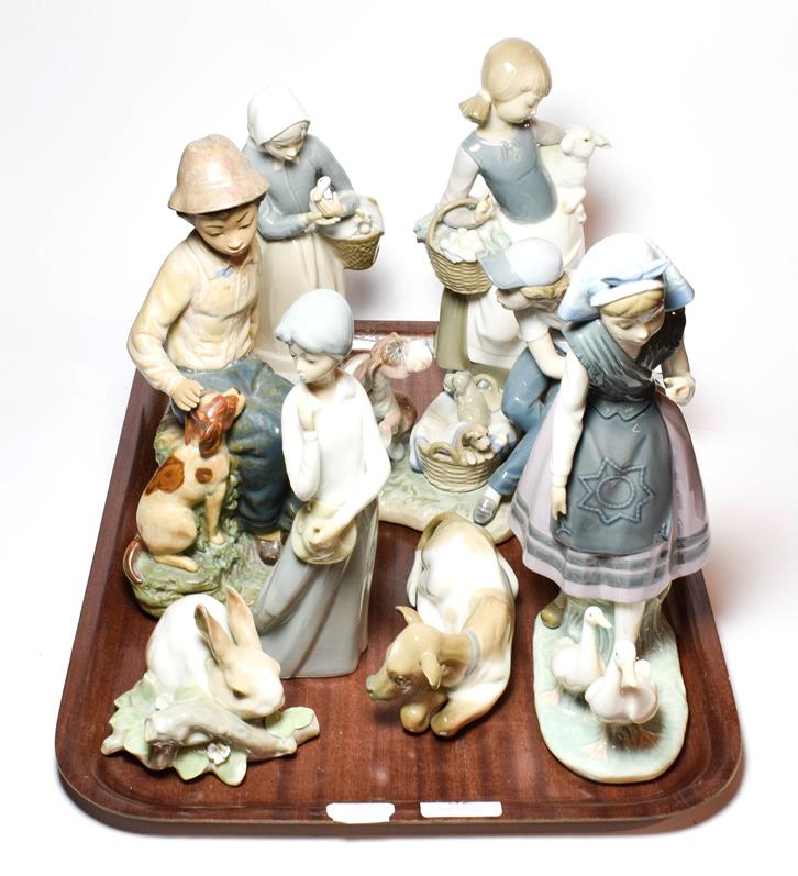 Six Lladro figural and animal theme ceramics, and two others by Casades and Nao (8)