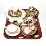 A group of Royal Crown Derby Imari and other tea wares. One 1128 saucer with a small chip. Chocolate