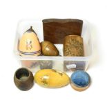 A collection of treen comprising two pears, two eggs - one with needlework items, an early straw