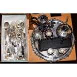 A selection of silver plated ware including a circular tray, community flatware, cased servers, pair