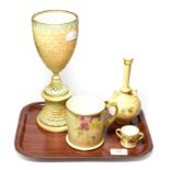 A Royal Worcester blush ivory pierced vase and three other Royal Worcester floral decorated items,