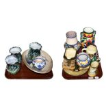 A quantity of decorative ceramics including Poole, Royal Doulton, Studio pottery dish etc (on two