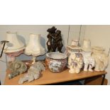 Three modern ceramic elephant garden seats, a modern Chinese jardiniere, four modern table lamps and