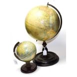 Philips 9'' Terrestial Globe on an ebonised stand, and a Chad Valley tin example (2)