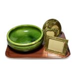 Three Art Nouveau style frames and a Clarence pottery Stockton-on-Tees green glazed bowl