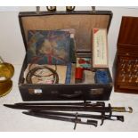 Four bayonets and a suitcase of assorted magician's items