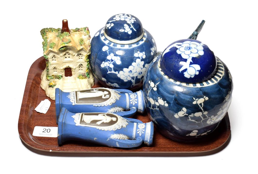 Two Chinese ginger jars and covers, a Chinese blue and white boat, a Staffordshire pastille