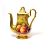 A Royal Worcester fruit decorated coffee pot, signed A Shuck, 17.785cm high.. Some slight crazing on