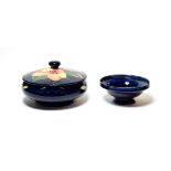 A Walter Moorcroft miniature dish and bowl with cover (2). Both first quality. Both with light