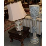 A Capodimonte ceramic pedestal jardiniere, and a large floral decorated ceramic table lamp with