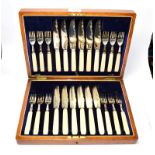 A cased set of Victorian and George V silver and ivory fish-eaters, by Allen & Darwin, Sheffield,