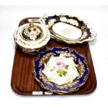 A pair of 19th century cobalt blue floral painted porcelain gilt decorated cabinet plates, similar