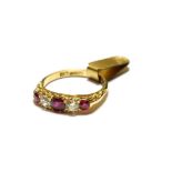 A synthetic ruby and diamond five stone ring, three graduated round cut synthetic rubies alternate