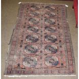 Baluch rug, the field with two columns of elephant foot guls enclosed by narrow borders, 118cm by