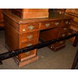 A late Victorian pedestal writing desk with attached label marked William Whiteley, London, 122cm by