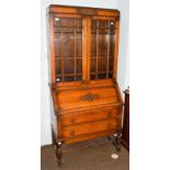 A 1920s oak bureau bookcase, 90cm by 44cm by 194cm