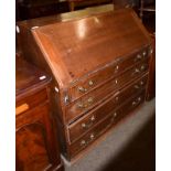 A George III oak bureau, 97cm by 50cm by 95cm