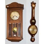 A mahogany inlaid wheel barometer, signed Bitore Albing, Bourton, together with an Art Deco wall