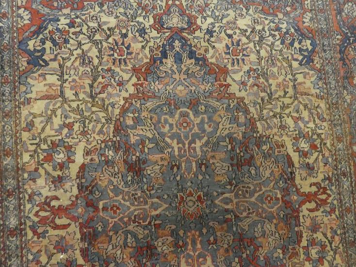 Isfahan rug, the central medallion surrounded by scrolling flowering vines, enclosed in a red - Image 3 of 8