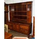 A George III checkered inlaid oak dresser and rack, the upper section with pierced fretwork, 185cm