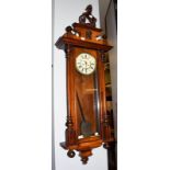 A Vienna type double weight driven wall clock, circa 1890. Case with minor scratches and minor chips