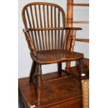 A 19th century elm Windsor chair, seat height 36cm