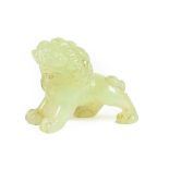 A Chinese Jade Figure of a Lion, in Ming style, standing four-square, 6.5cm long; A Similar Figure