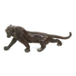 A Japanese Bronze Figure of a Tiger, Meiji period, naturalistically modelled standing roaring,