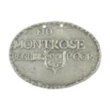 Montrose, a beggar's badge, of oval form, cast with a flowerhead in a shield and inscribed No11