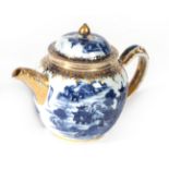 A Chinese Porcelain Teapot and Cover, Qianlong, of ovoid form, painted in underglaze blue with