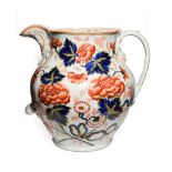 A Staffordshire Stone China Toilet Jug, circa 1850, of fluted baluster form with leaf sheathed spout