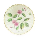 A Chelsea Porcelain Botanical Fluted Saucer, circa 1755, painted with a sprays of pinks within a