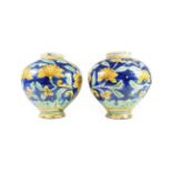 A Pair of Caltagirone Maiolica Bombola, 17th/18th century, of typical form, painted in blue, green