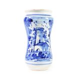 A Ligurian Maiolica Albarello, dated 1711, of waisted cylindrical form, painted in blue with a