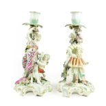 A Pair of Derby Porcelain Figural Candelabra, circa 1765, modelled as Mars and Venus, he with his