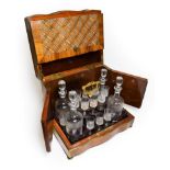 A Napoleon III Brass Bound and Ivory Inlaid Parquetry and Kingwood Cased Travelling Drinks' Set,